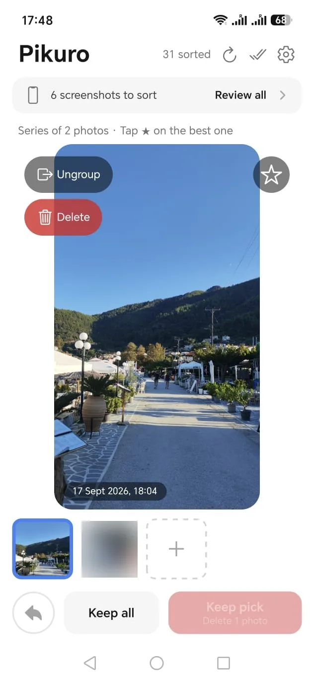 A series of two photos taken seconds apart, with a star to pick the best one and a Keep pick button.